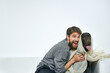 © SHOTPRIME STUDIO - Happy man with dog and light fabric fun scarf friends pet