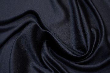 Wall Mural - Fabric suit black stretch out of wool. Beautiful background for design.