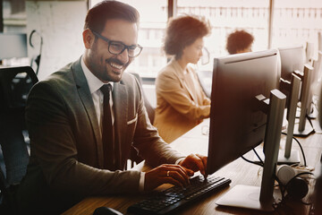 software engineers working on project and programming in company