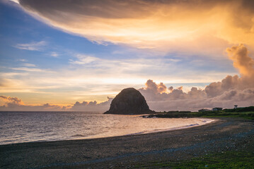 Wall Mural - scenery of Mantou Rock located in Lanyu at dusk