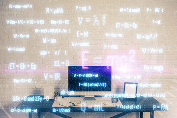 Desktop computer background and formula hologram writing. Double exposure. Education concept.