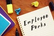 Business concept meaning Employee Perks with phrase on the page.