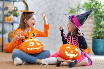 Happy family celebrating Halloween