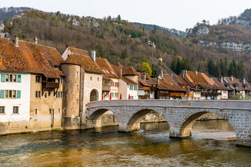 Nice day in Saint-ursuanne late morning from St.Jean bridge. Unseen classical town in Switzerland