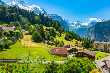 Wall Mural - Wonderful mountain car-free village Wengen, Bernese Oberland, Switzerland. The Jungfrau is visible in the background