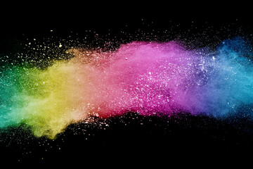 Wall Mural - abstract multicolor powder on black background. holi festival.