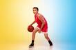 © master1305 - Strategy. Full length portrait of young basketball player in uniform on gradient studio background. Teenager confident posing with ball. Concept of sport, movement, healthy lifestyle, ad, action