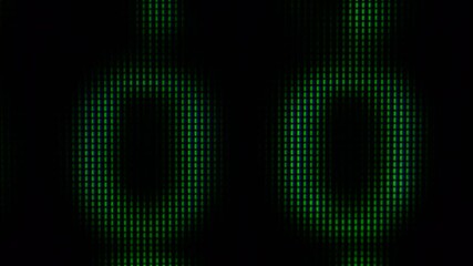 Wall Mural - close up on computer screen binary code on black background.