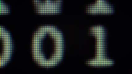 Wall Mural - close up on computer screen binary code on black background.