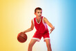 © master1305 - Full length portrait of young basketball player in uniform on gradient studio background. Teenager confident practicing with ball. Concept of sport, movement, healthy lifestyle, ad, action, motion.