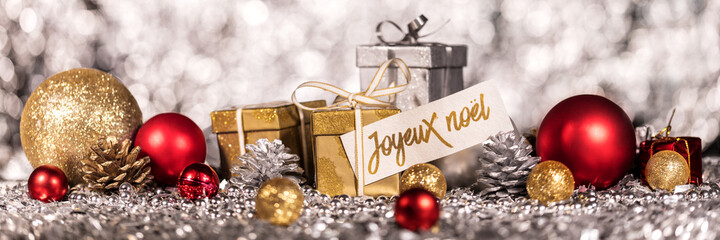 panorama with shiny christmas decoration and french text