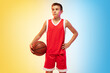 © master1305 - Full length portrait of young basketball player in uniform on gradient studio background. Teenager confident posing with ball. Concept of sport, movement, healthy lifestyle, ad, action, motion.