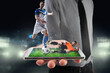© alphaspirit - Real soccer players that are displayed on a cellphone during a match