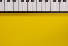 Piano Keyboard Isolated On Colorful Background With Space For Writing. Competition Concept