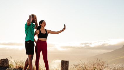 Wall Mural - Running couple taking selfie