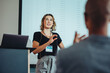 © Jacob Lund - Business woman speaking during a seminar