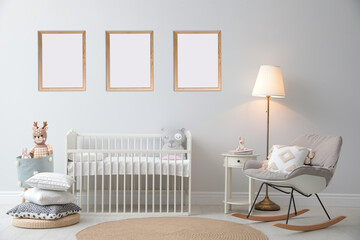Poster - Stylish nursery interior with empty posters on wall. Mockup for design