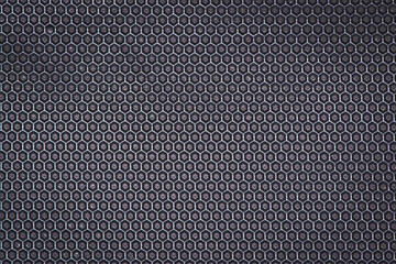 Plastic surface with cells pattern texture closeup photo background.