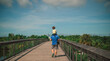 © Tamara Sales  - walking down the bridge of Baker park in Naples Florida in southwest Florida public park