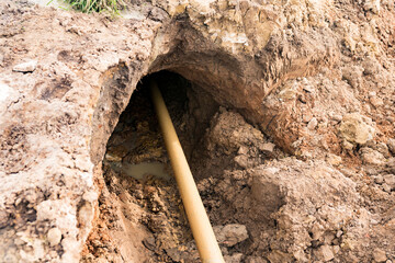 Horizontal directional drilling technology closeup. Drilling machine work process. Trenchless laying of communications, pipes and water pipes