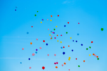 Many colorful balloons flying in the sky. Birthday, celebration, festival, wedding, childhood, hope and anniversary concept