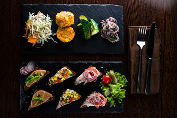 Sticker - set of bruschetta on a black stone