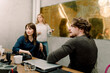 © Maskot - Business people working at creative office
