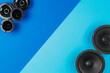 © Oleksii Halutva - Car audio, car speakers, on a blue background. Copy space