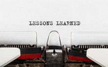 Text LESSONS LEARNED Typed On Typewriter