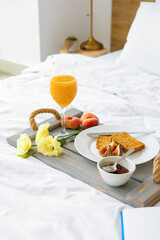 Canvas Print - Tray with tasty breakfast on bed