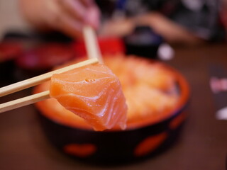 Salmon raw sashimi in Japanese restaurant.