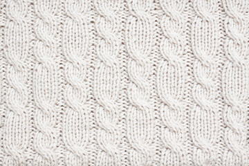 Knitted wool texture, cable stitch pattern, handmade cloth