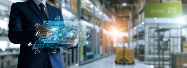 Aufkleber - Businessman holding virtual interface panel of global logistics network distribution and transportation, Smart logistics, Innovation future of transport on large warehouse center background.