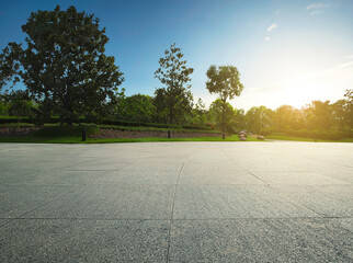 Wall Mural - Garden nature landscape with empty floor during sunrise