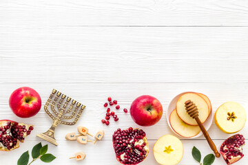 Wall Mural - Rosh Hashana jewish new year concept. Apple and honey on the table, top view