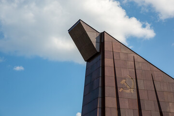 Soviet War Memorial in Berlin with a background of clouds and blue sky