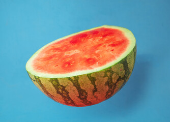 Poster - blue background with delicious watermelon open in half