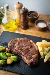 Canvas Print - new york strip steak with french fries and brussels sprout