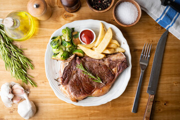 Wall Mural - new york strip steak with french fries and brussels sprout