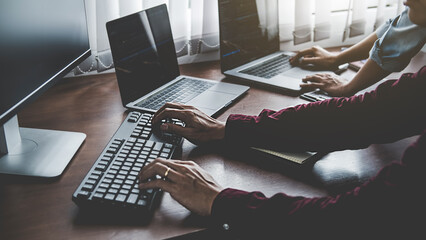 Wall Mural - programmer working in a software development and coding technologies. website design. technology con