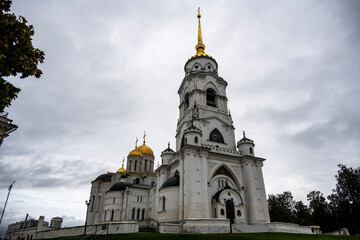 old white stone church on a hill in the old town