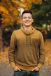 © anatoliycherkas - Portrait of handsome guy smiling in the autumn park