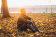 © anatoliycherkas - Handsome and happy boy smiling in the autumn park