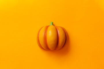 Pumpkin on color background.  Halloween, harvest, etc.　カラー背景上のカボチャ。ハロウィン、収穫など