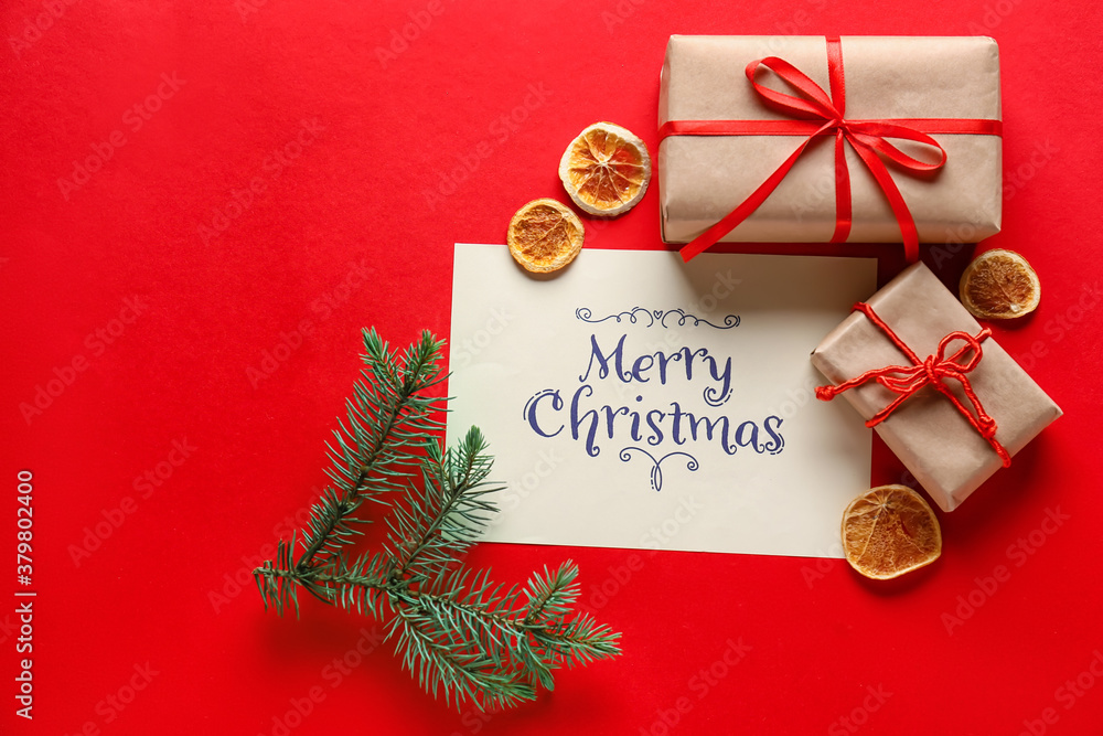 Beautiful composition with Christmas greeting card on color background
