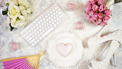 Wall Mural - White aesthetic wedding bridal theme desktop workspace with high heel shoes, bouquets and accessories on stylish white textured background. Top view blog hero header creative composition flat lay.