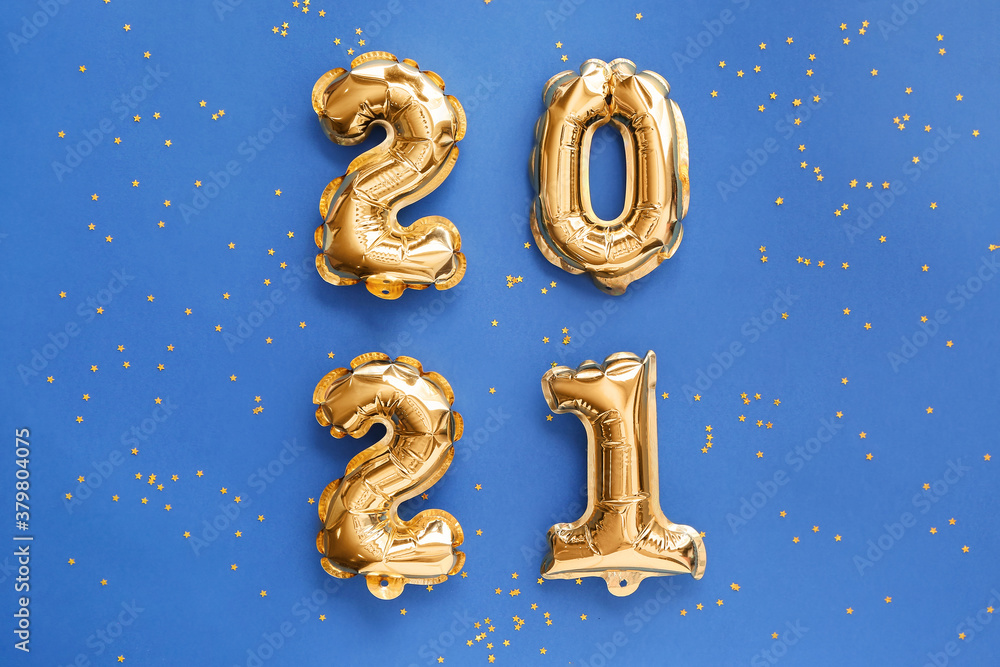 Balloons in shape of figure 2021 on color background. New Year celebration