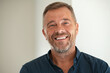 © Rido - Portrait of happy mature man smiling