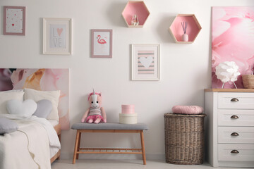 Poster - modern teenager's room interior with comfortable bed and beautiful pictures
