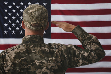 Wall Mural - Soldier in uniform against United states of America flag, back view